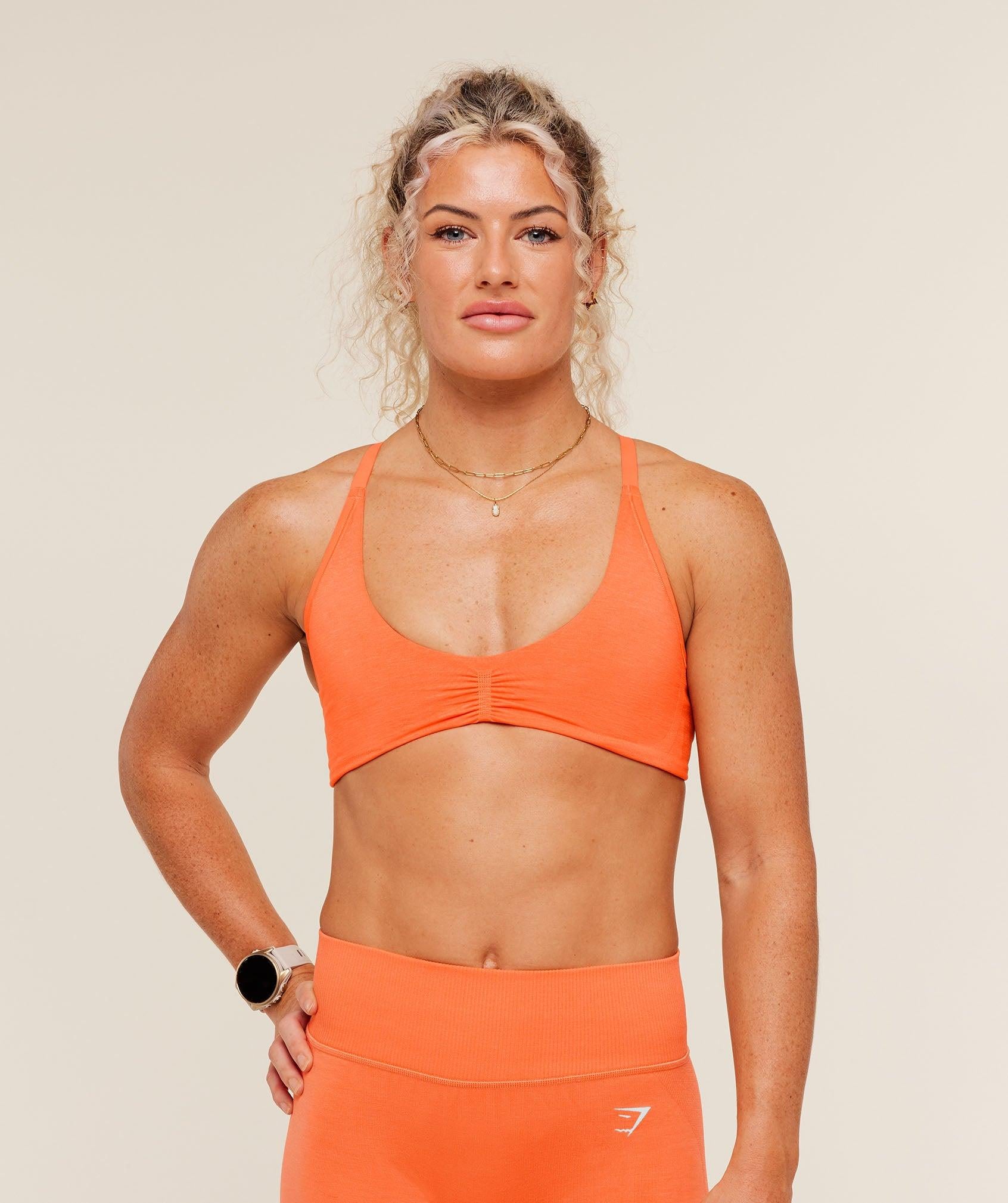 Interval Seamless Light Support Sports Bra Day Glow Peach